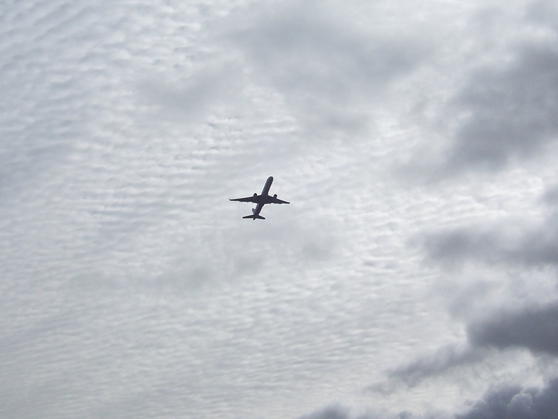 Plane taking off from LAX over Gillis