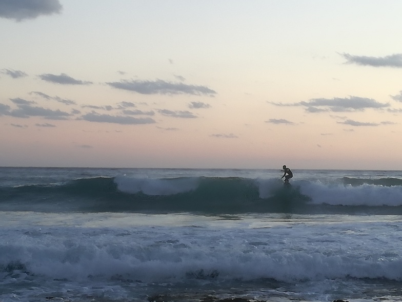 Evening surf at corner of the beach, Portixeddu