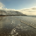 Snowy beach at Caswell Bay