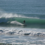 Chalet - A rare left, Pines (Wainui Beach)