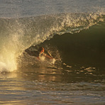 Riding in a tube, Newport beach