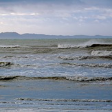 Rare surfing day in Golden Bay, Patons Rock