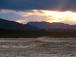 Surfing in Golden Bay, Patons Rock photo