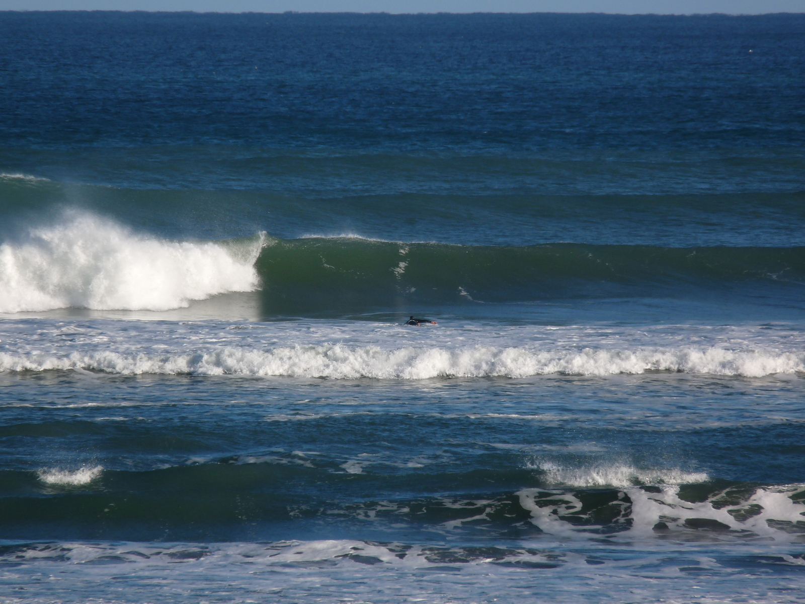 Paddling out at Paturau, Paturau River