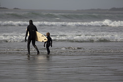 Master and grommet, Cox Bay photo