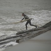 Jumping into the surf from Surfside Jetties-2-21-2015