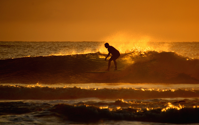 Port long boarder at sunrise, Port Macquarie-Town Beach