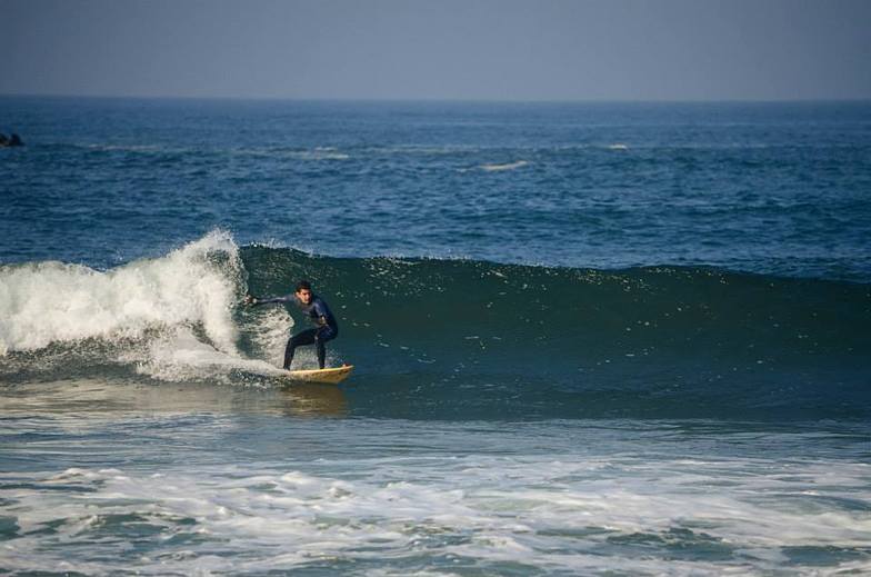 Surfing at the pier, Rosarito