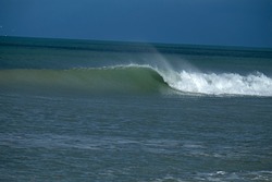 Clean swell, Amberley Beach photo