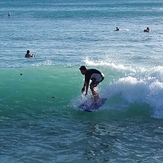 body sufer waikiki at the "wall" by Moana Anuenue