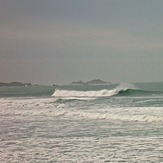 Big swell, Corbiere in background, St Ouen's Bay - Secrets