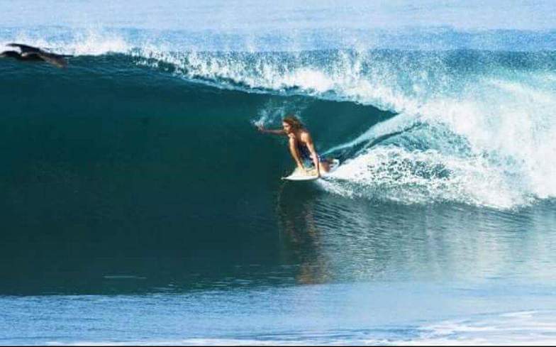 Abel estopin gliding under what inspired him before he surfed (pelicans) in paradise, Cuyutlan