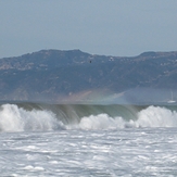 Rainbow in wave spray, Gillis