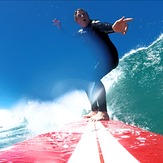 Summertime at St Kilda Phil on the red QB, Dunedin - St Kilda Beach