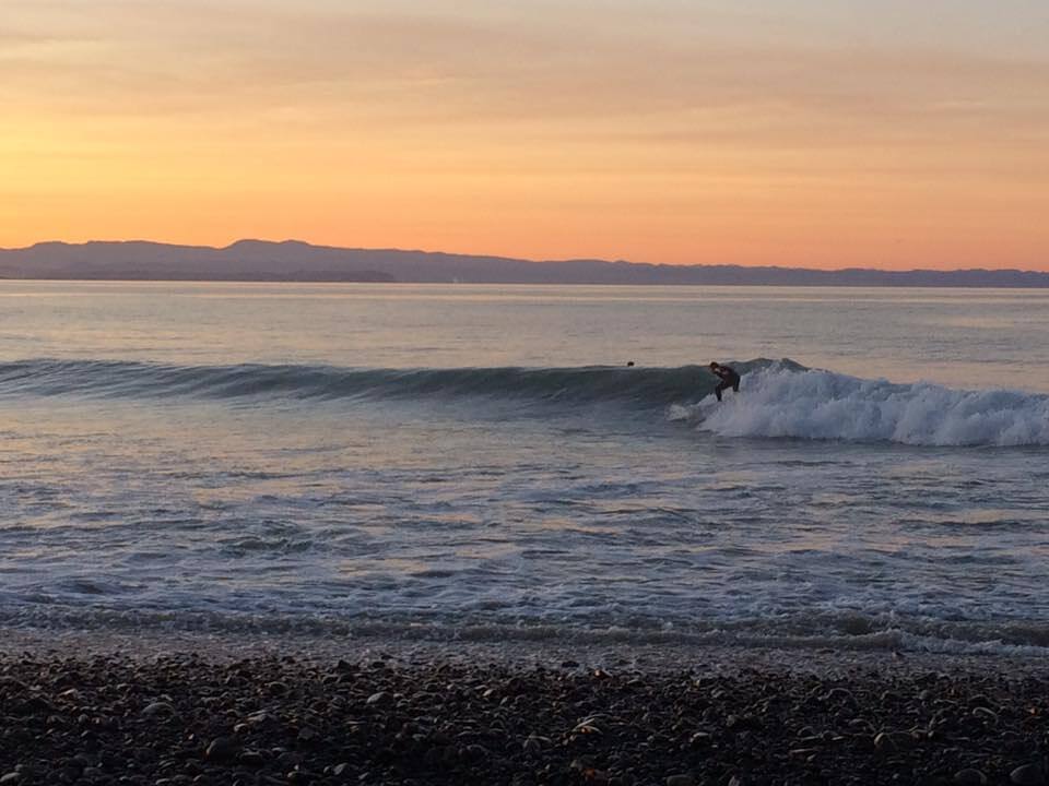 Winter sunset surfing., Te Awanga