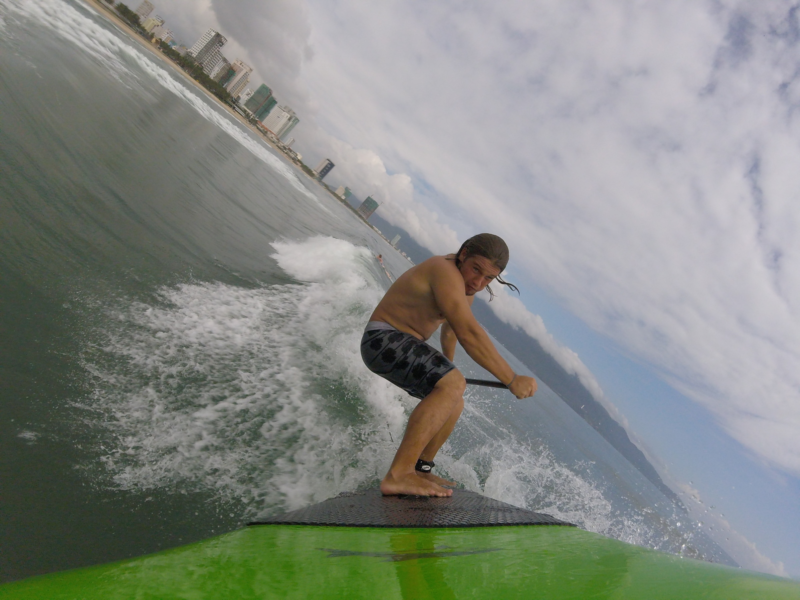 Sup surfing in Danang, My Khe / Da Nang