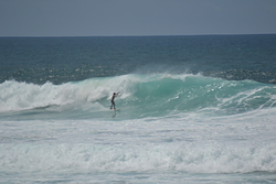 Left local surfer, Itaúna photo