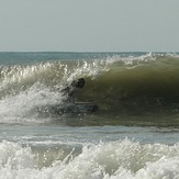 Early morning and super low tide. Good swell. Mui ne local surfer 