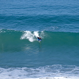 Michelle surfs a west coast shorey, Anatori River