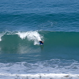 Michelle surfs a west coast shorey, Anatori River