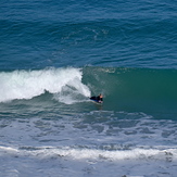 Michelle surfs a west coast shorey, Anatori River