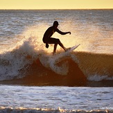 "Winter Sunrise Silhouette Surfer", Garden City Pier