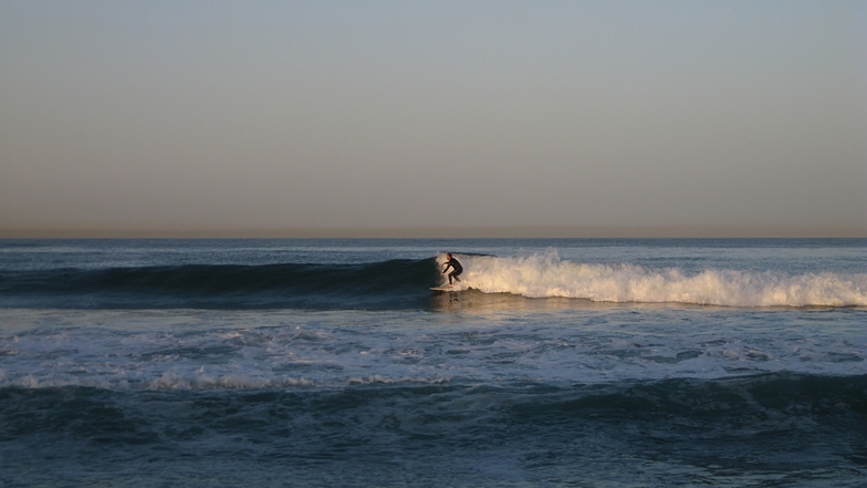 surfer at break near lifeguard tower 45, Gillis