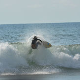 Moises Rojas catching some good waves, Tamarindo