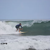 Patrick Mihalic getting a barrel in Playa Grande