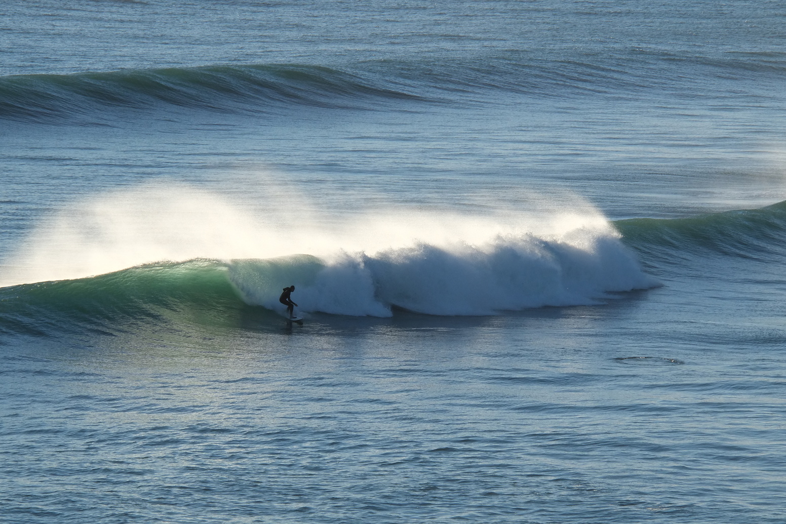 Glassy high tide reef near Anatori, Anatori River