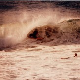 Mark Bell laying back in big hollow left, Catherine Hill Bay