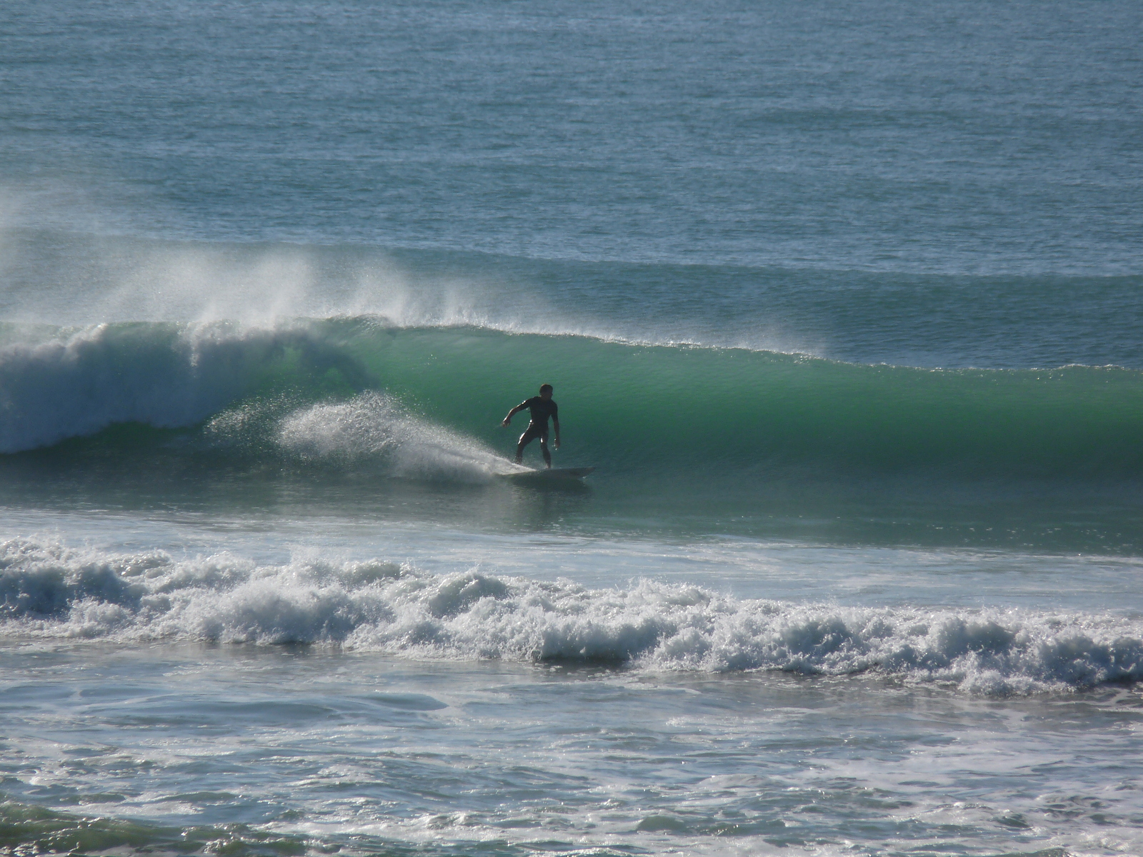 Chalet - A rare left, Wainui Beach - Pines