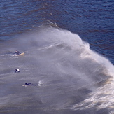 Surfers at Rhossili Bay