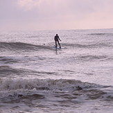 SUP surfing with a foil at Ruby Bay