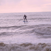 SUP surfing with a foil at Ruby Bay