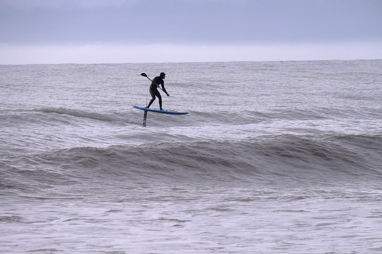 SUP surfing with a foil at Ruby Bay