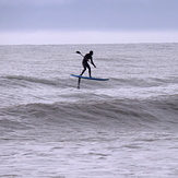 SUP surfing with a foil at Ruby Bay