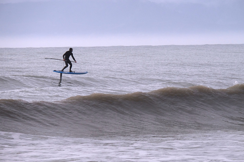 SUP surfing with a foil at Ruby Bay