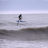 SUP surfing with a foil at Ruby Bay