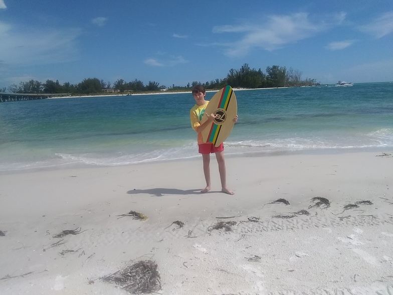 Hayden Pearson with a skim board., Anna Maria Island