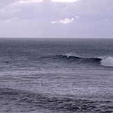 Fun autumn swell at Oxwich Point.