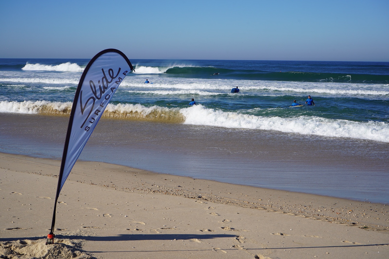 Slide Surfcamp | surfing lesson, Praia da Vagueira