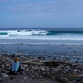 Short-lived early autumn swell at Kumera Patch.