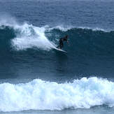 Short-lived early autumn swell at Kumera Patch.