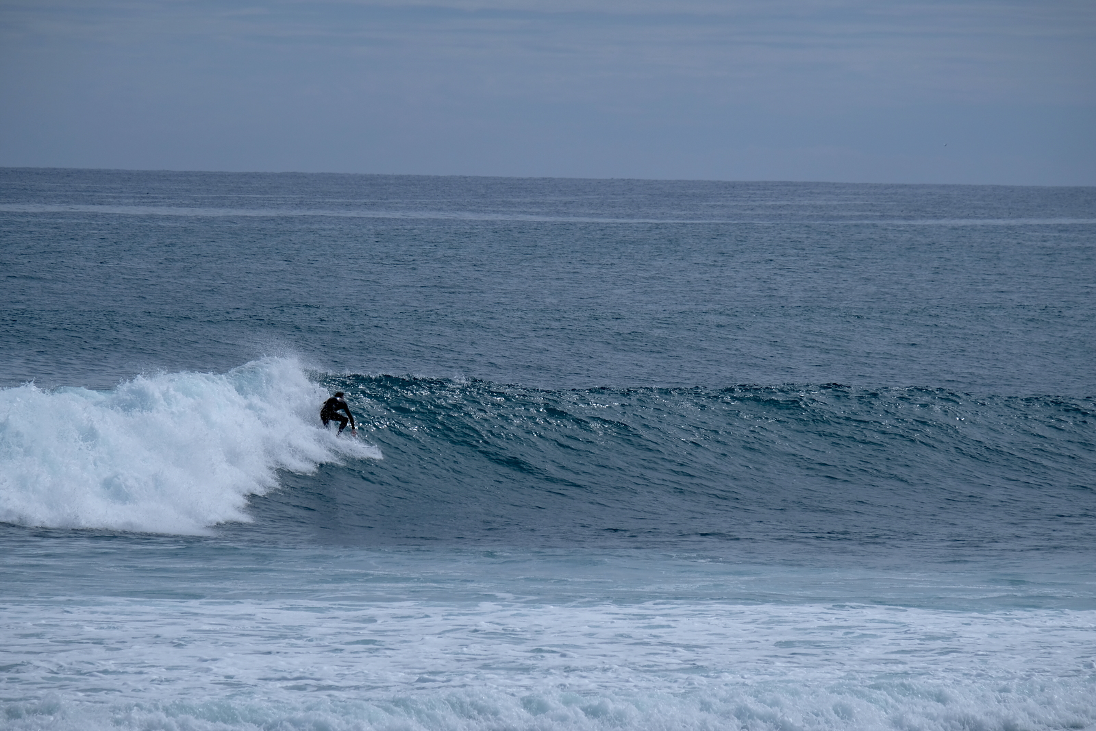 Short-lived early autumn swell at Kumera Patch.
