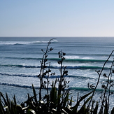 Short-lived early autumn swell at Kumera Patch.