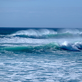 Short-lived early autumn swell at Kumera Patch. As the afternoon tide filled sets started breaking across the bay east of the point.