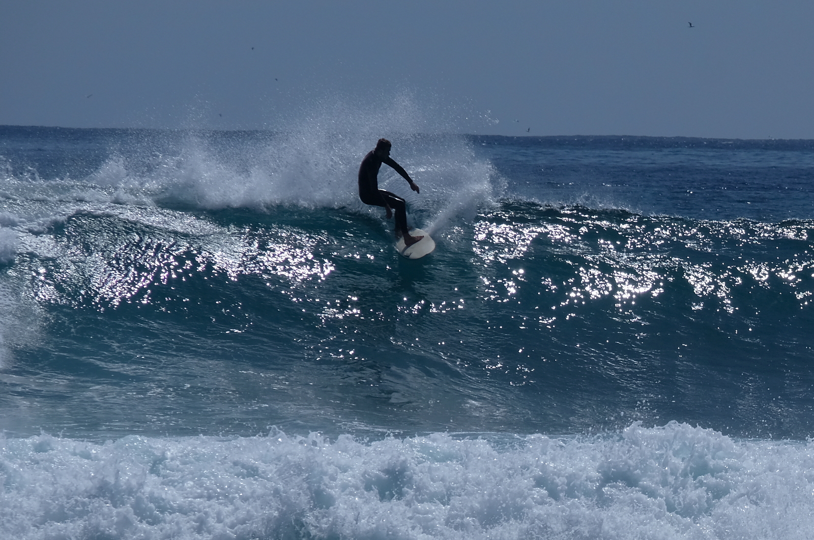 Short-lived early autumn swell at Kumera Patch.
