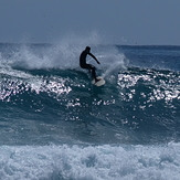 Short-lived early autumn swell at Kumera Patch.