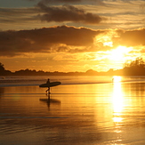 Surfer in March at Sunset, South Chesterman Beach